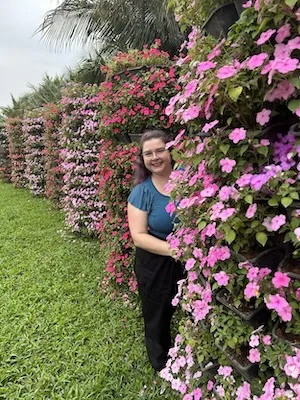 Coby Jones in some flowers