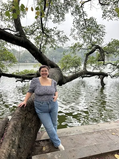 Coby Jones smiling in a tree